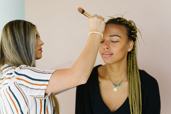 Makeup Artist Applying Makeup to Client | LashLift Store